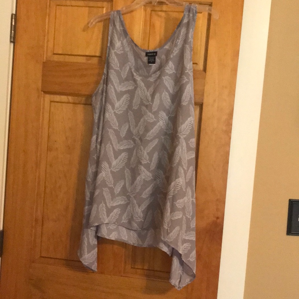 Torrid Waterfall Tank with Feather Graphic.